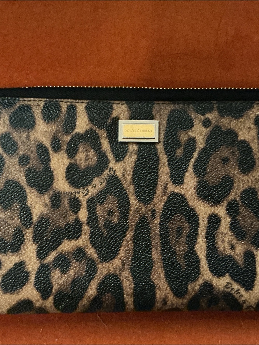 Dolce & Gabbana Silver Logo Zip Pull on Rust Brown Leather
